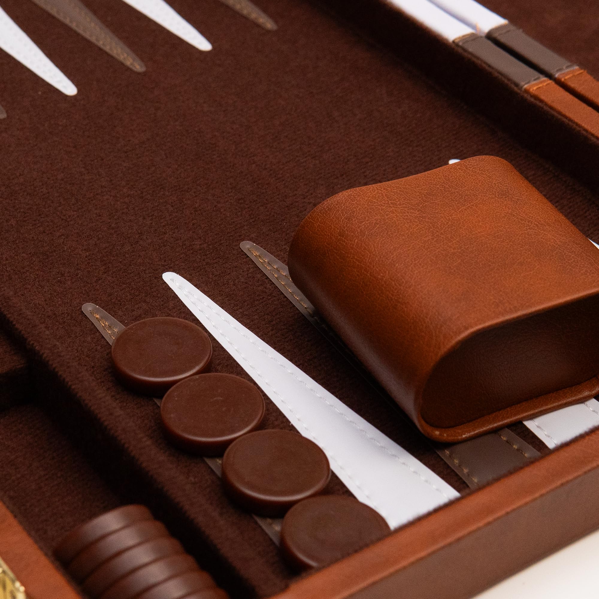 Happy Hippo leather-like brown case protects the deluxe backgammon set during travel.