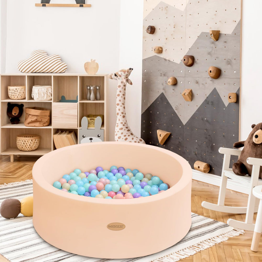 Harbolle beige ball pit adds stylish storage and play area for babies and kids.