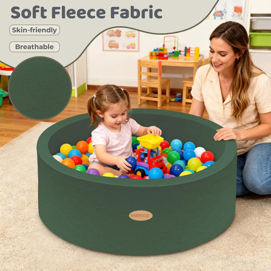 Interior of Harbolle ball pit features cushioned fabric for gentle sensory play.
