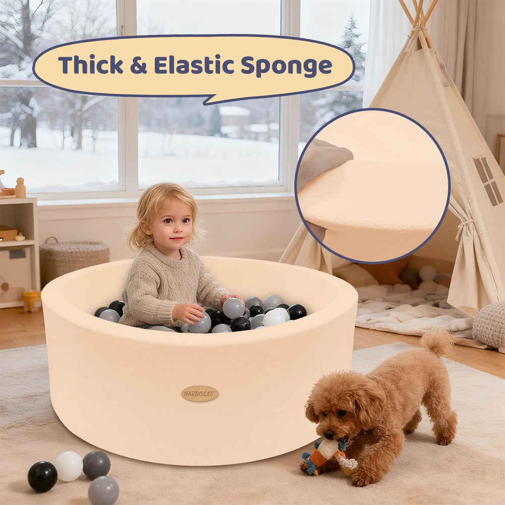 Harbolle children playing ball pit emphasizes social play and shared fun.