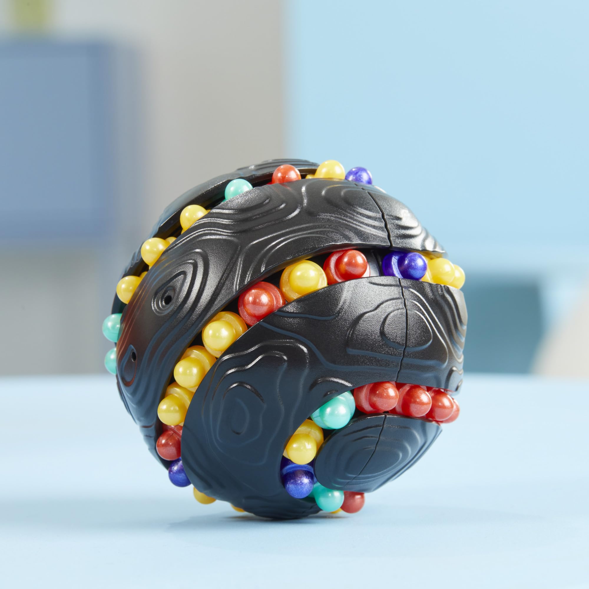 Hasbro Atomix sphere paths showing three routes for beads