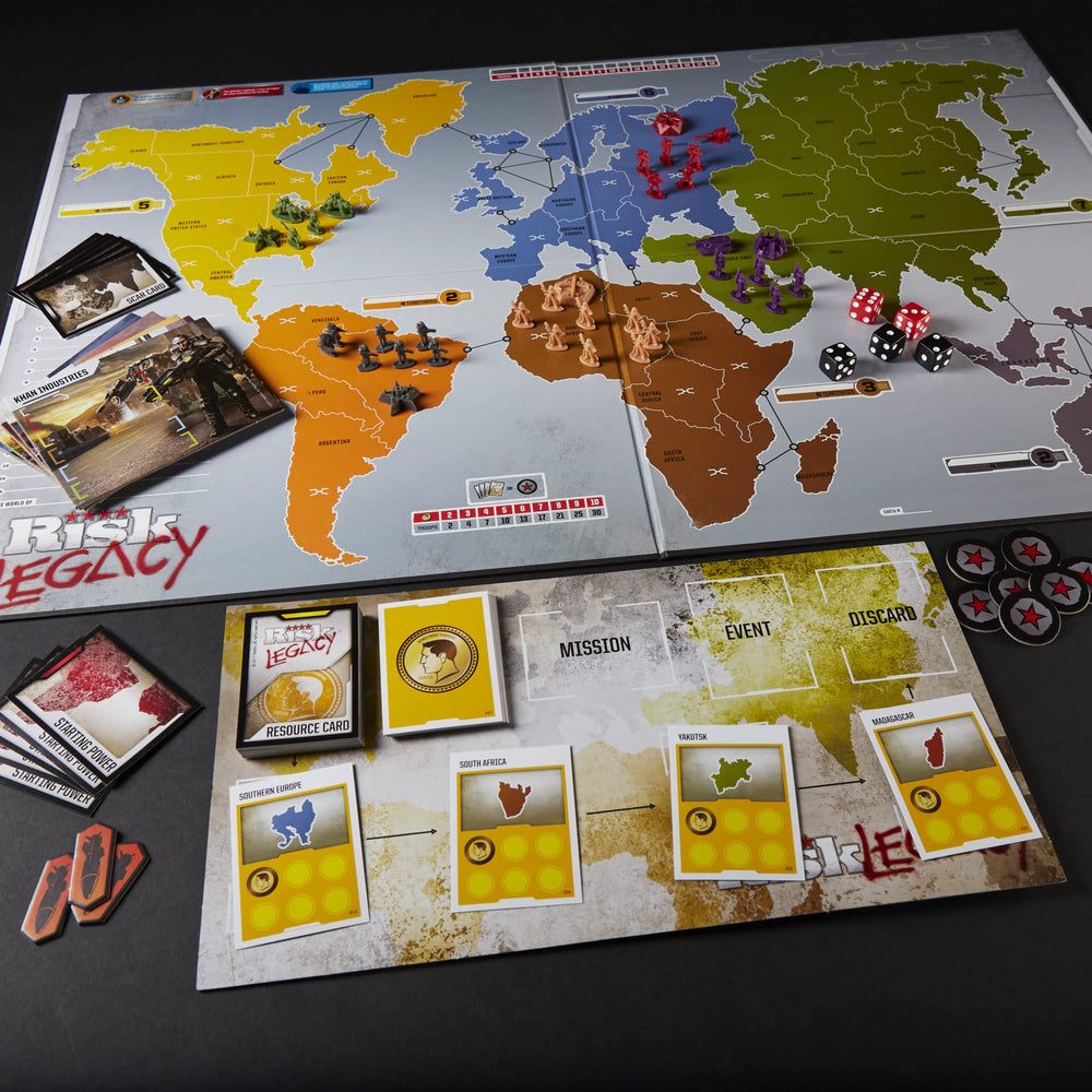 Hasbro Avalon Hill Risk Legacy card deck laid out for evolving rules and events.