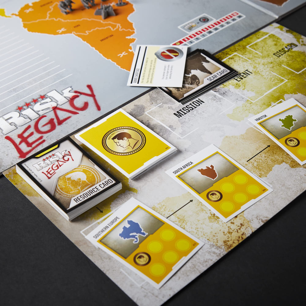 Hasbro Avalon Hill Risk Legacy rulebook open to legacy mechanics.