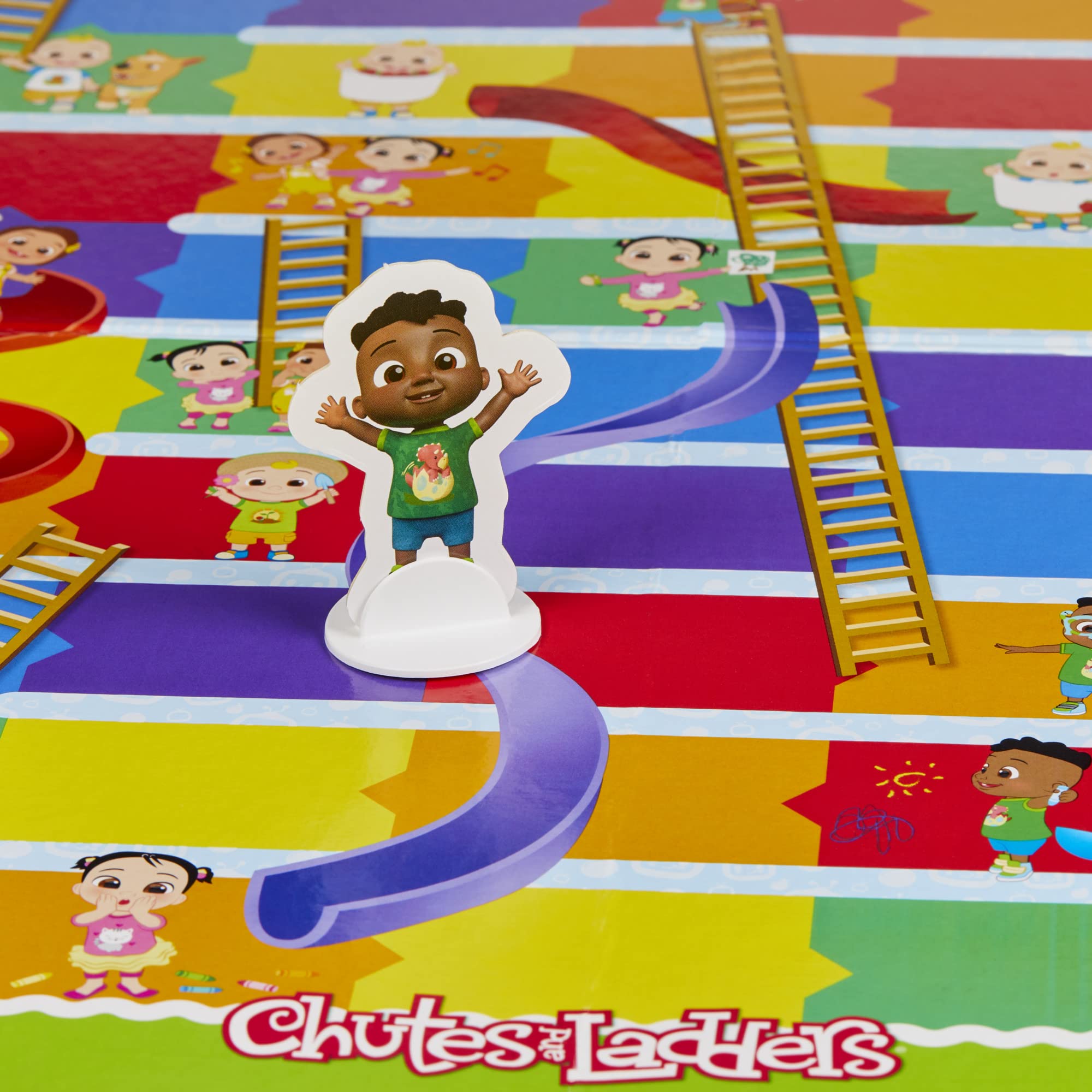 Hasbro Gaming Chutes and Ladders CoComelon Edition supports 2-4 players for family fun.