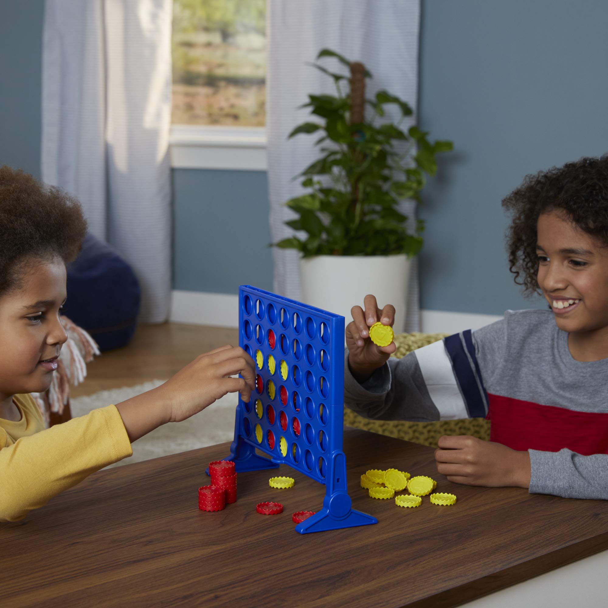 Durable plastic Connect 4 grid built for repeated family play