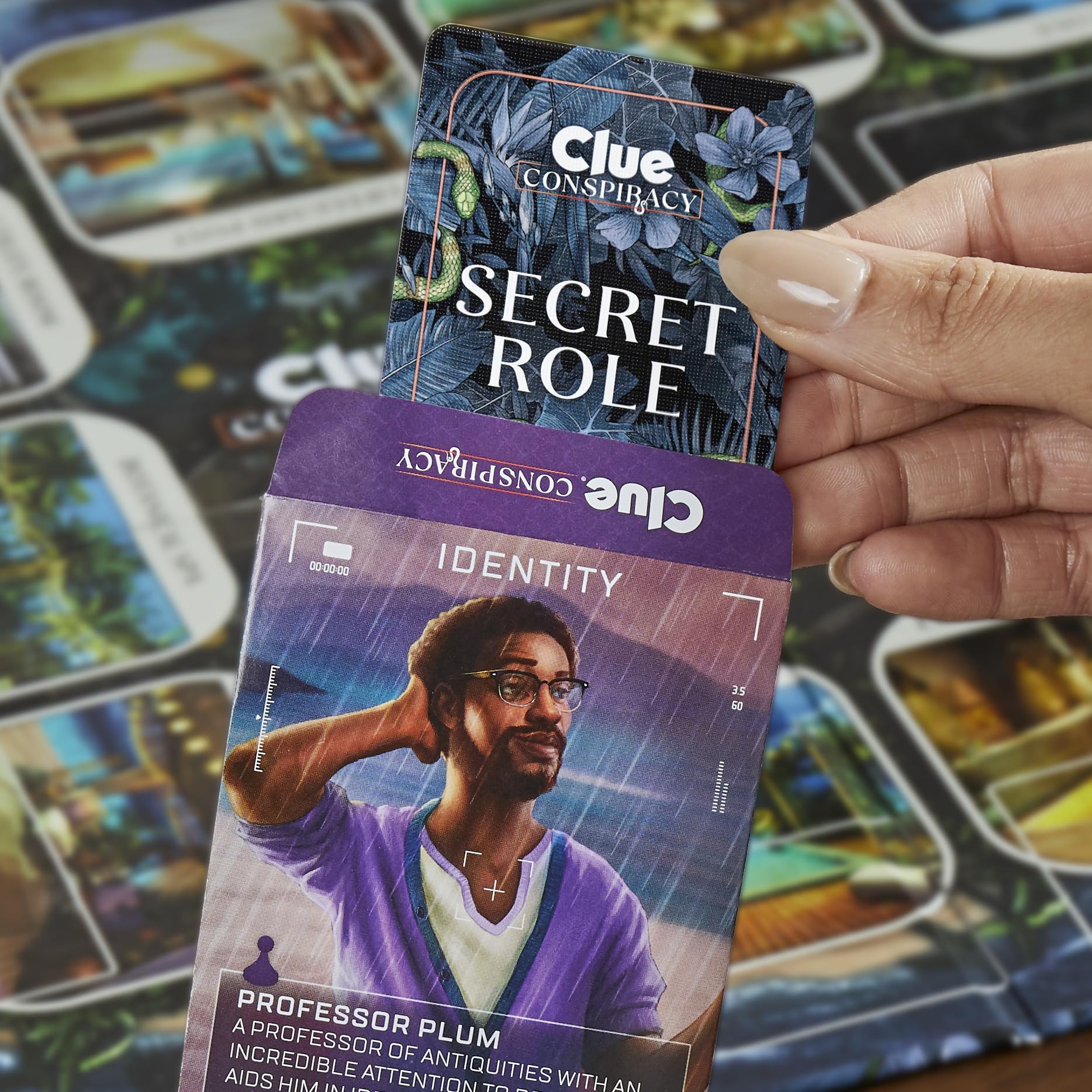 Hasbro Gaming Clue Conspiracy resort traps build tension and risk.