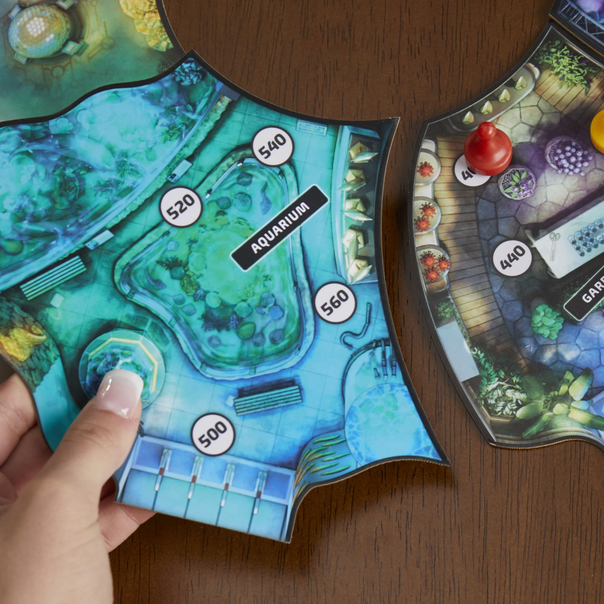 Hasbro Gaming Clue Escape World’s Fair exhibit halls showing evolving locations.