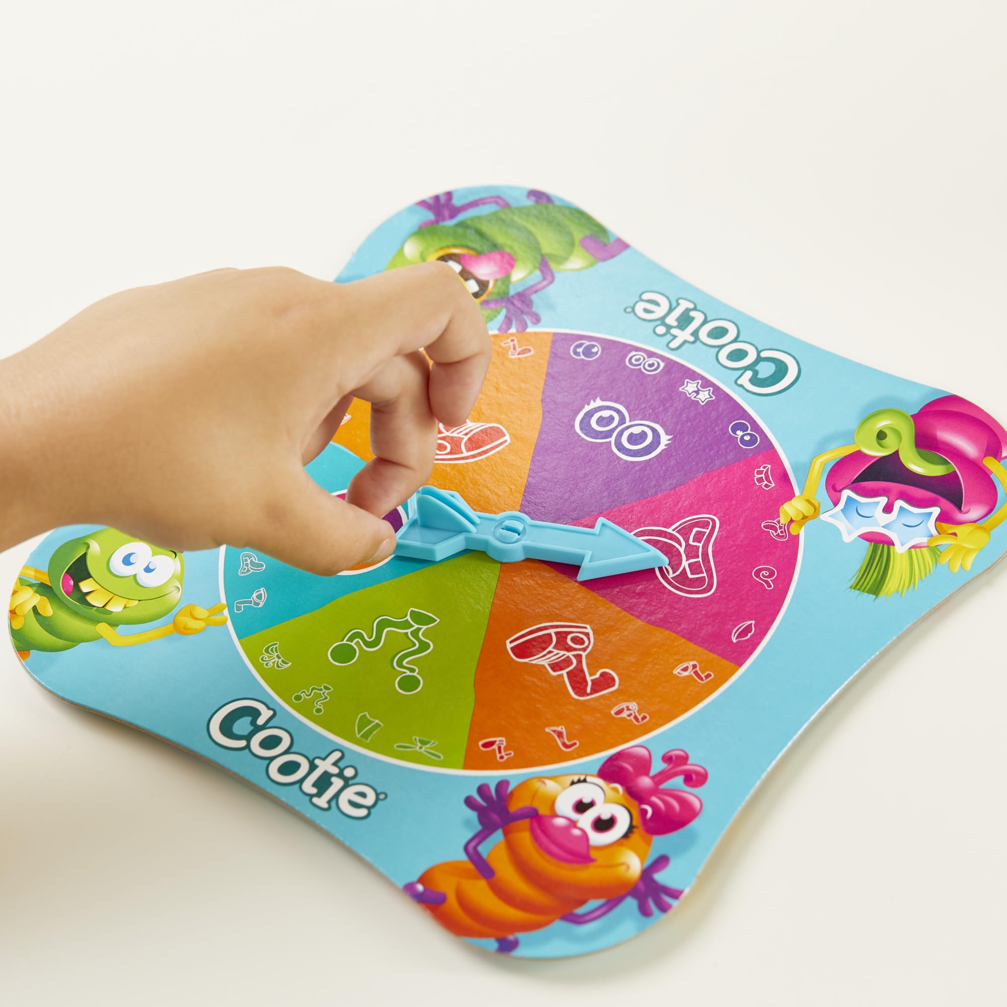 Hasbro Gaming Cootie colorful pieces inspire imaginative bug creation.