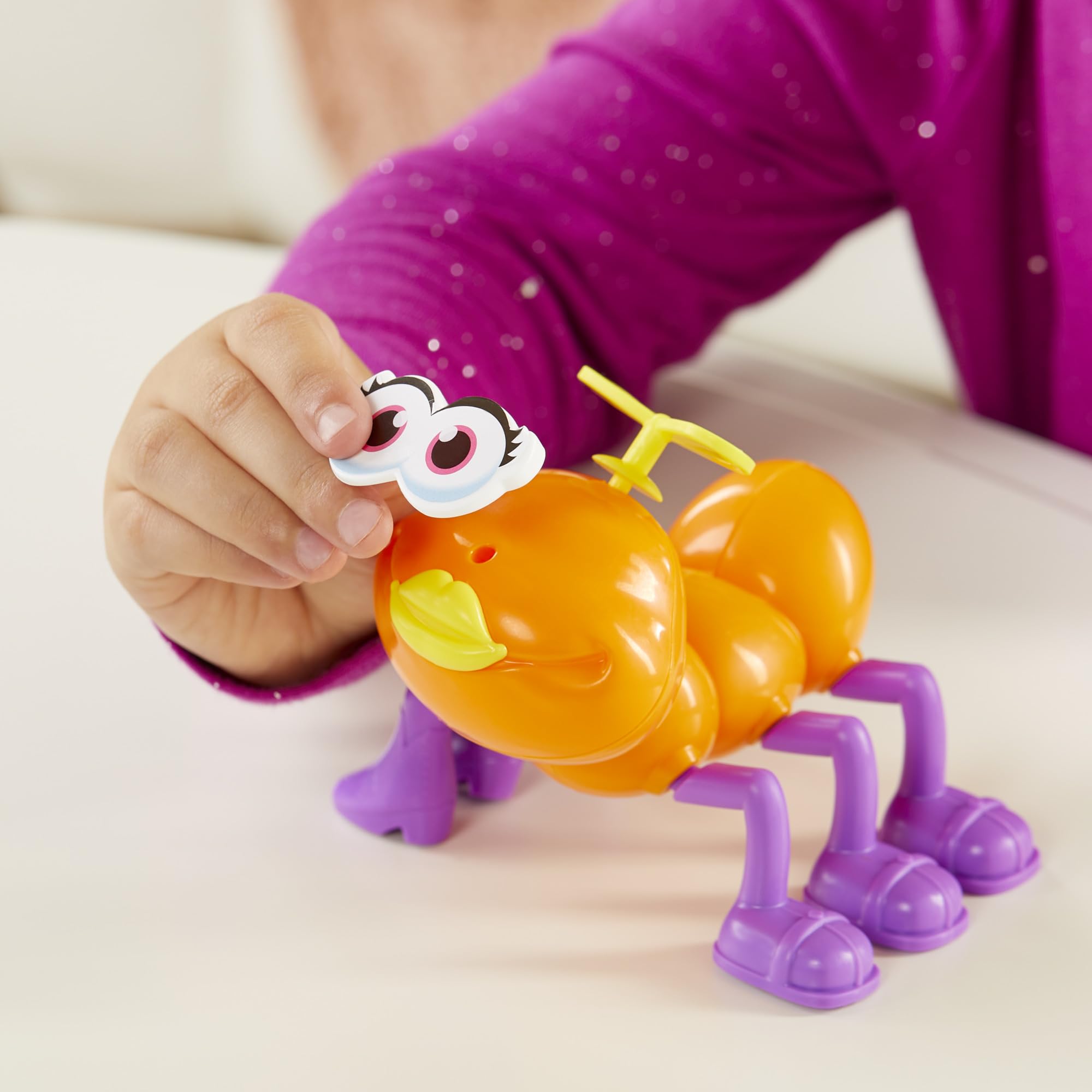 Hasbro Gaming Cootie mix-and-match play encourages imagination.