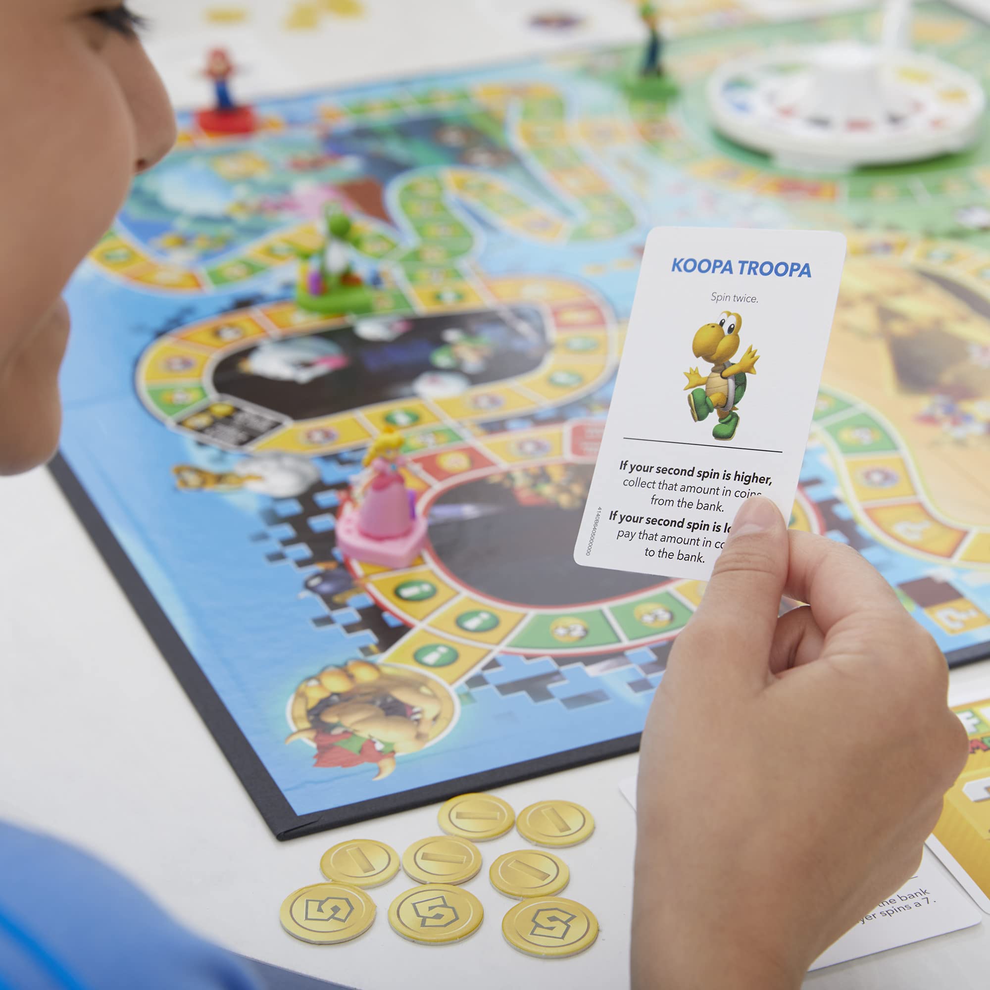 Hasbro Game of Life: Super Mario Edition family game night suitable for ages 8 and up.