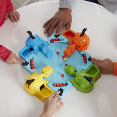 Hasbro Gaming Hungry Hungry Hippos golden marble highlight, quick win potential during play.
