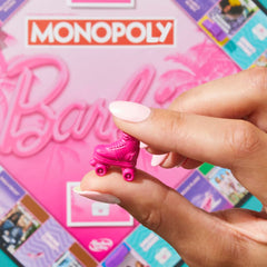 Hasbro Gaming Monopoly Barbie Fun board game Barbie board showcases familiar streets.