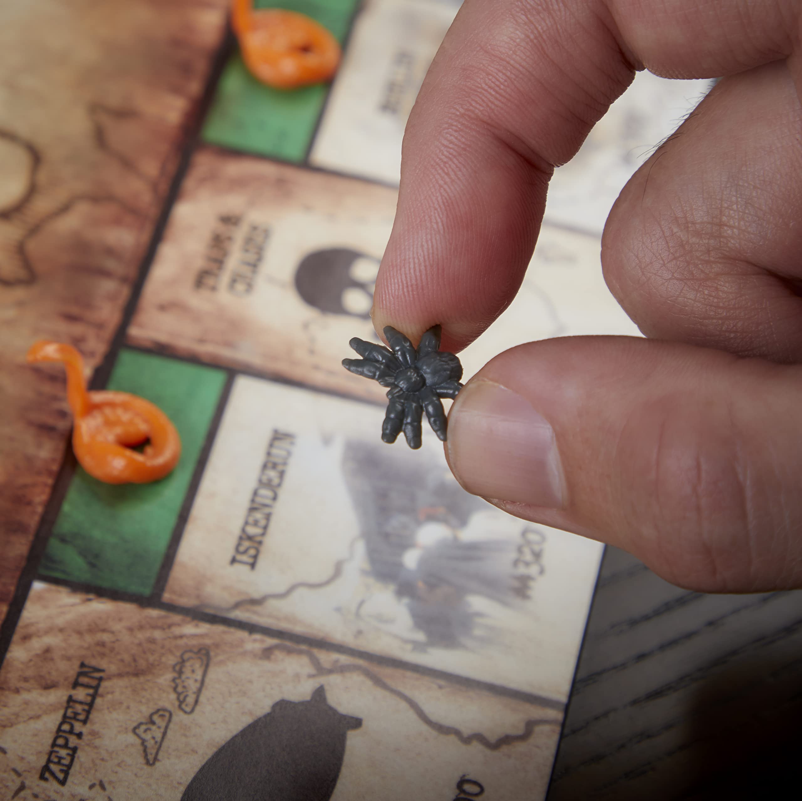 Hasbro Gaming Monopoly Indiana Jones Edition artifact-holy-grail token showcases legendary relics to seek.