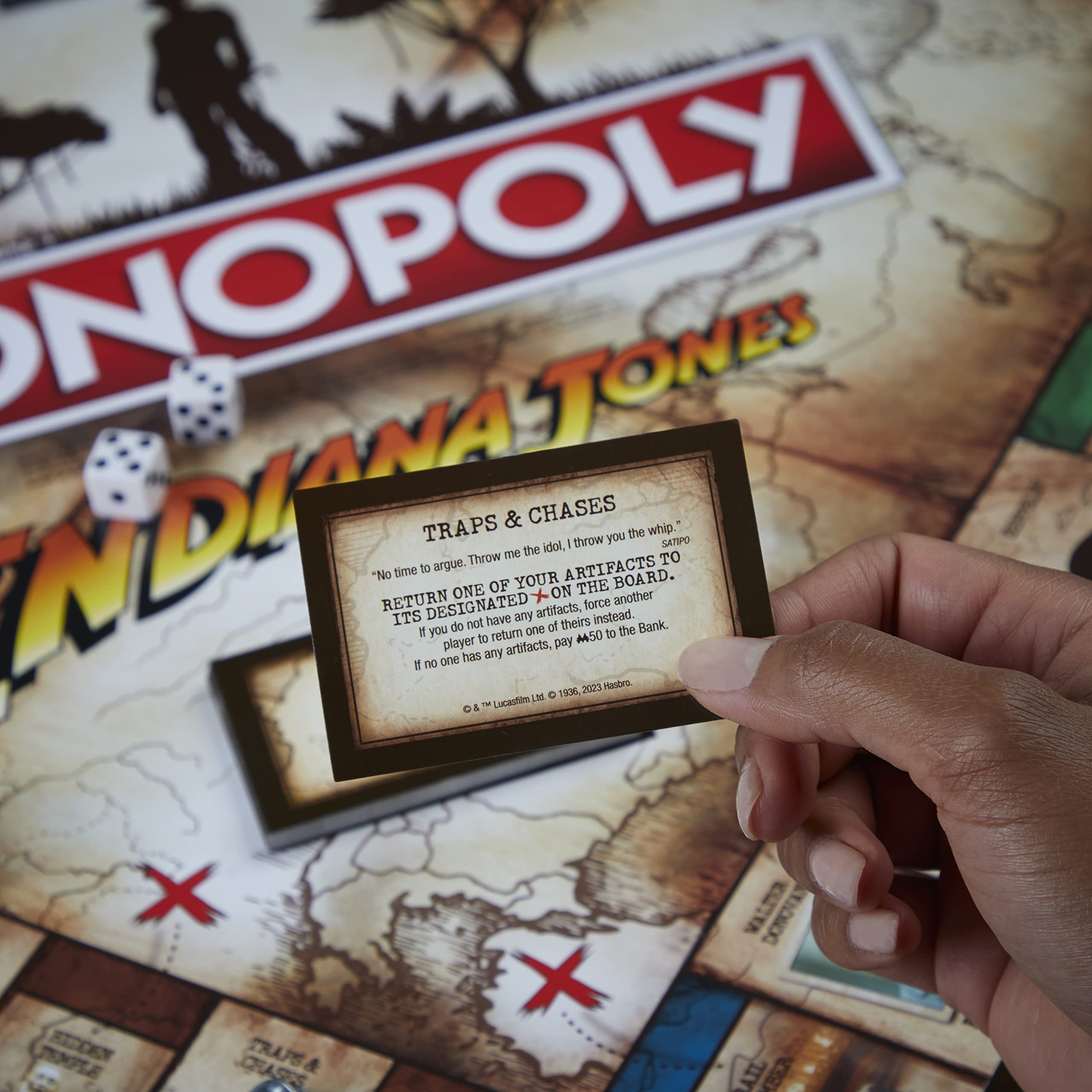 Hasbro Gaming Monopoly Indiana Jones Edition artifact-golden-idol token highlights treasure-hunting excitement.