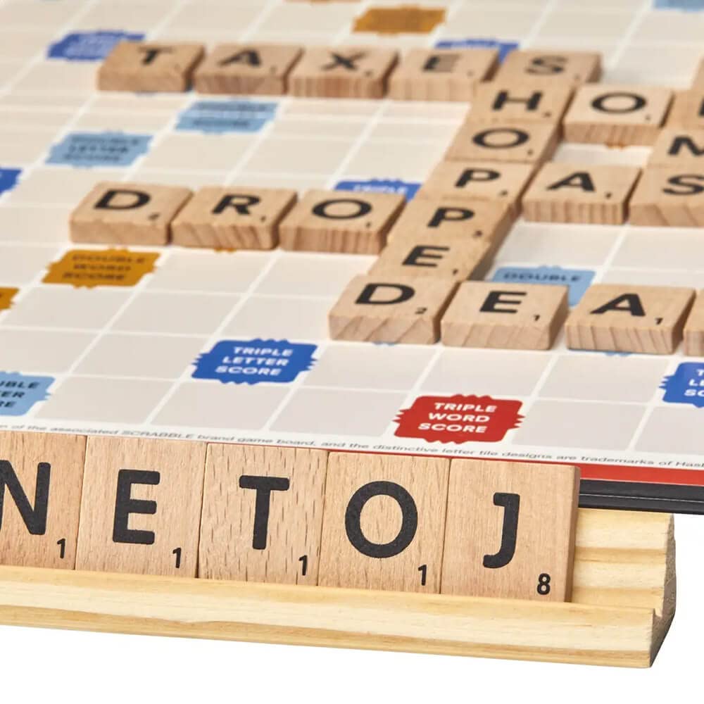 Hasbro Scrabble 2-4 players setup supports head-to-head or teams