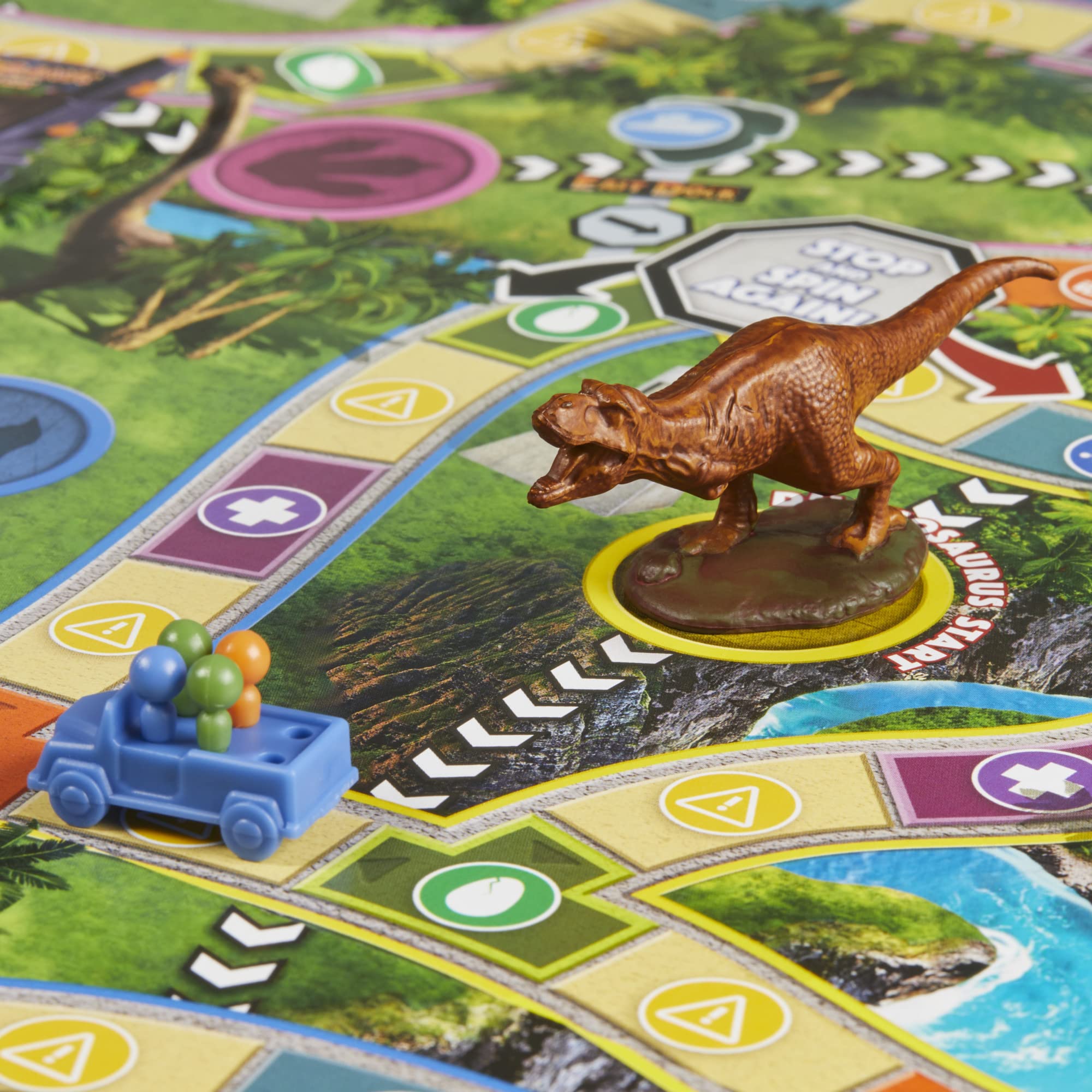 Hurricane graphic approaching island scene from Hasbro Gaming The Game of Life Jurassic Park Edition