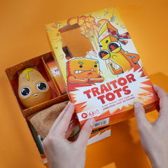 Hasbro Gaming Traitor Tots oven mitts motif adds tactile charm.
