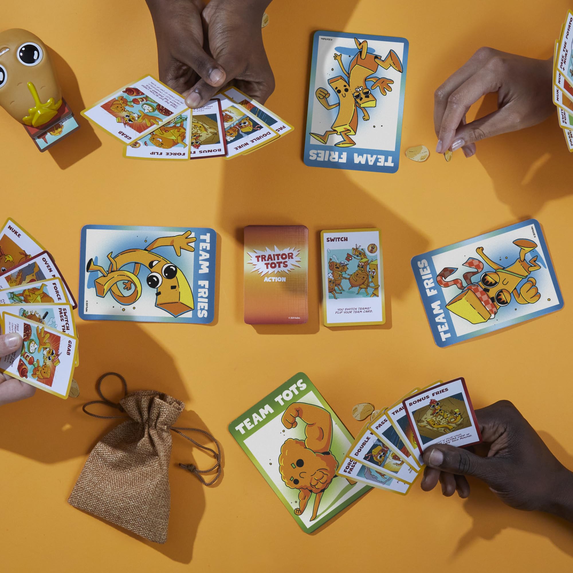 Hasbro Gaming Traitor Tots pass the potato mechanic keeps everyone engaged.