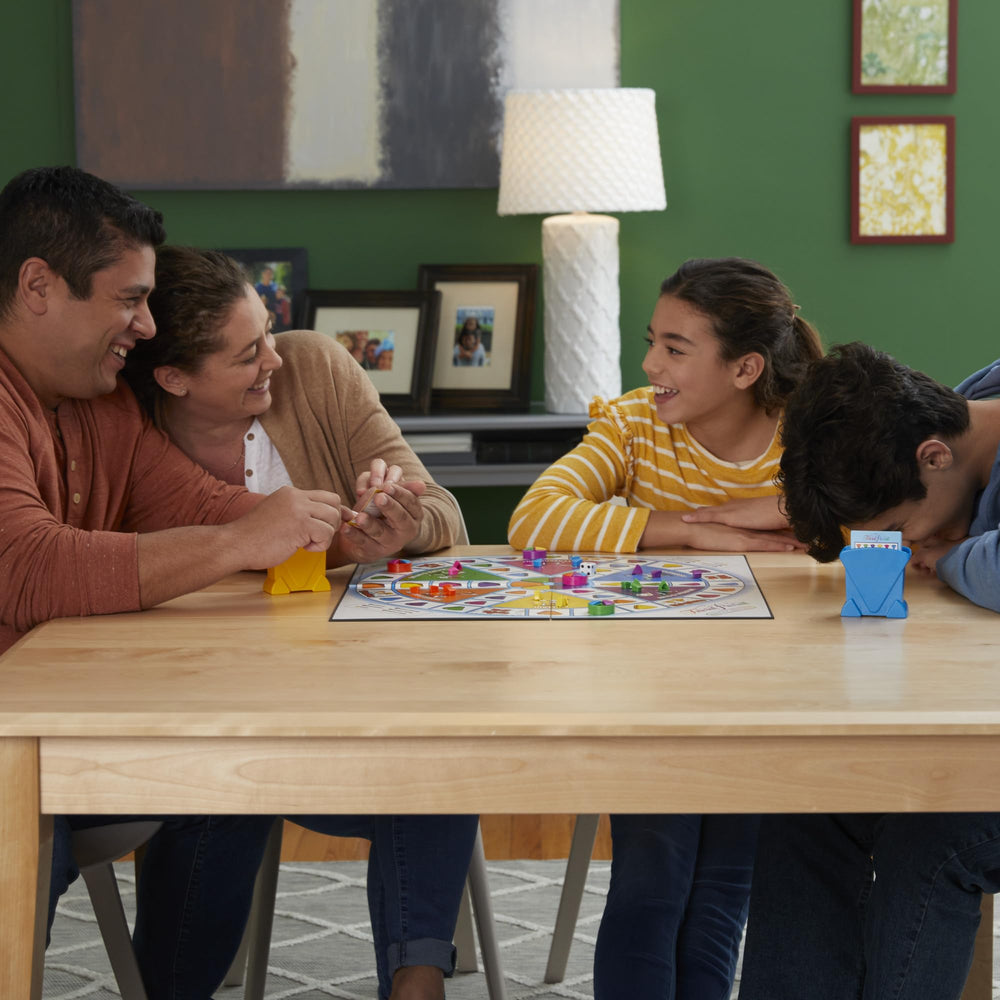 Hasbro Gaming Trivial Pursuit Family Edition classic die in use