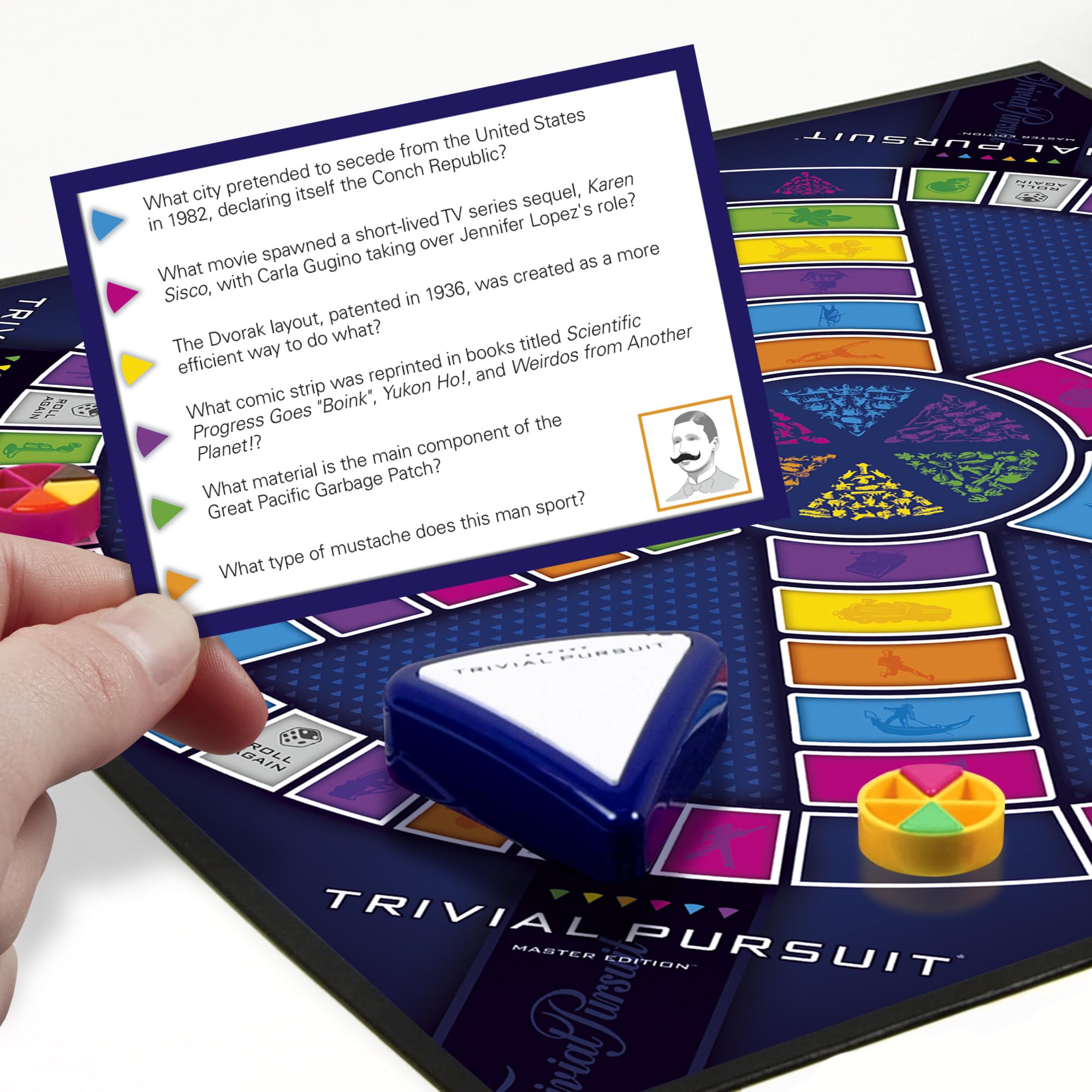 Hasbro Gaming Trivial Pursuit Master Edition question cards with thousands of prompts