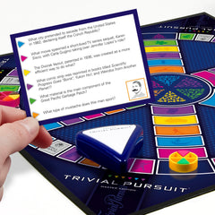 Hasbro Gaming Trivial Pursuit Master Edition question cards with thousands of prompts