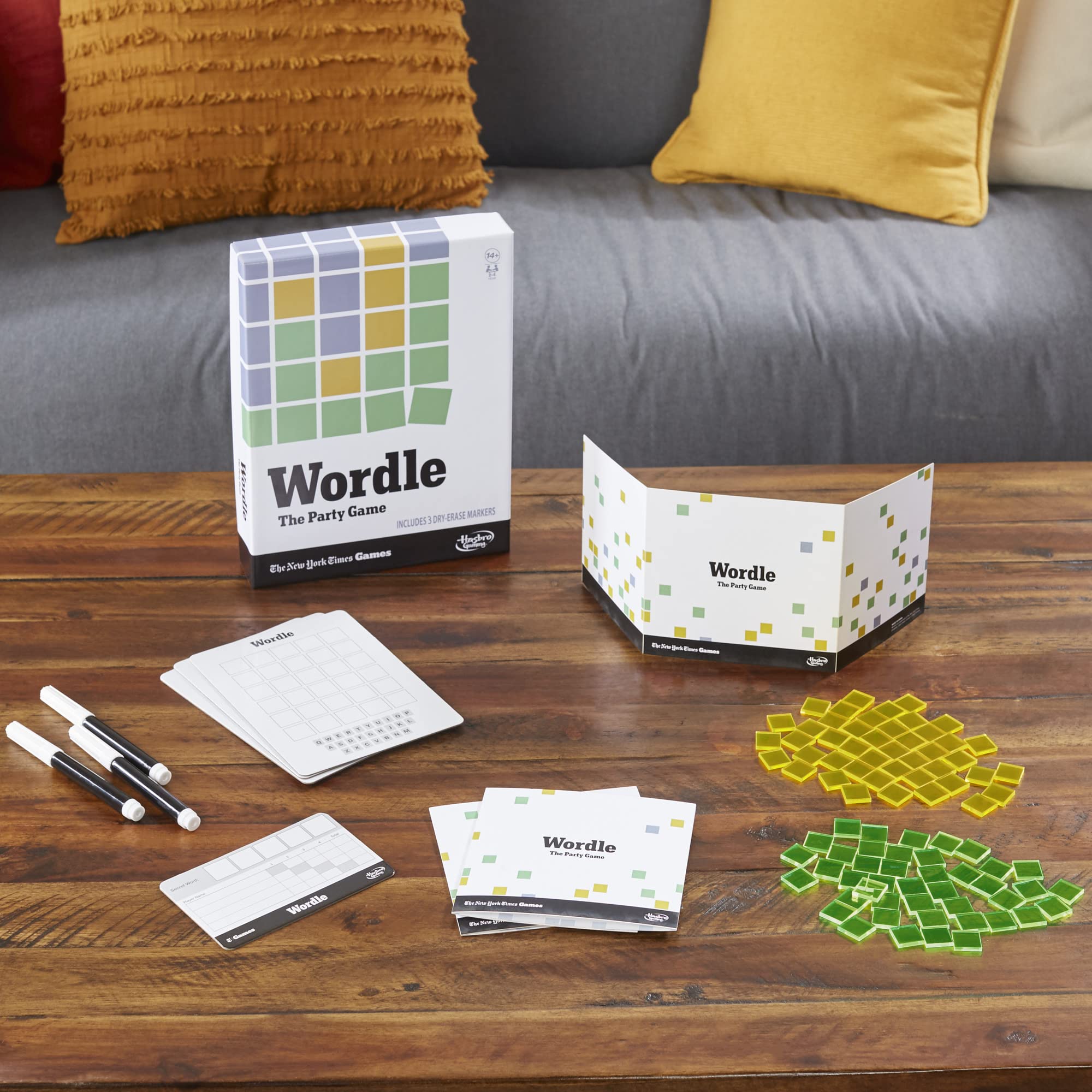 Hasbro Wordle: The Party Game score sheets show progress and standings during rounds.