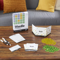 Hasbro Wordle: The Party Game score sheets show progress and standings during rounds.