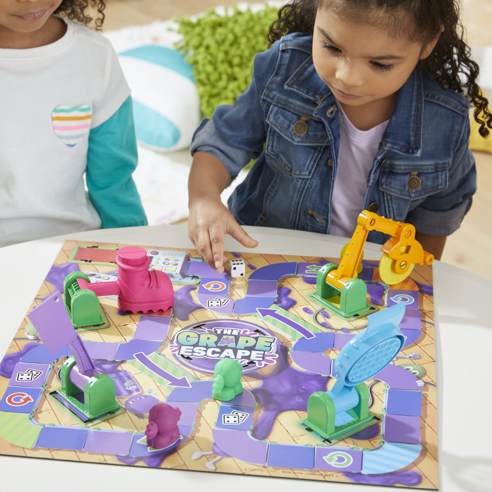 Hasbro Grape Escape launcher visible on the board