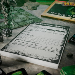 Hasbro HeroQuest crypt darkness premium packaging with shiny foil embossing.