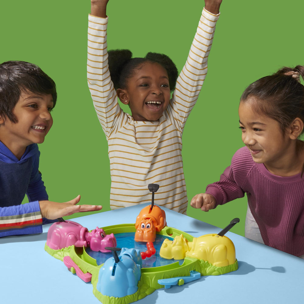 Hasbro Hungry Hungry Hippos center-marble-pool serves as the engaging focal point.