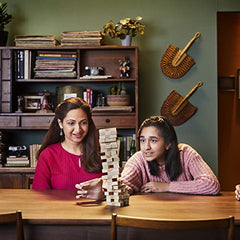 Hasbro Jenga travel-ready setup on a coffee table