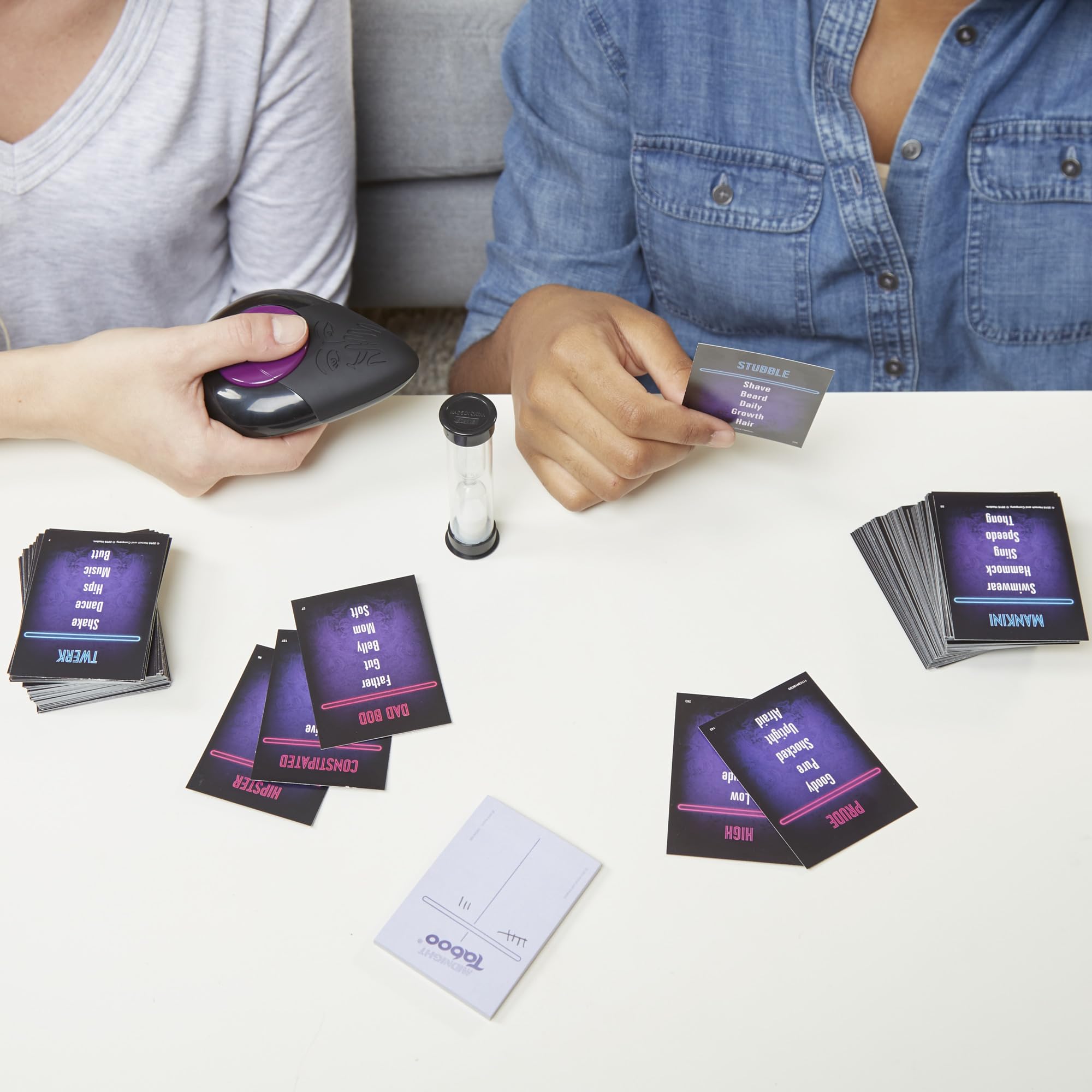 Hasbro Midnight Taboo buzzer signaling a turn interruption