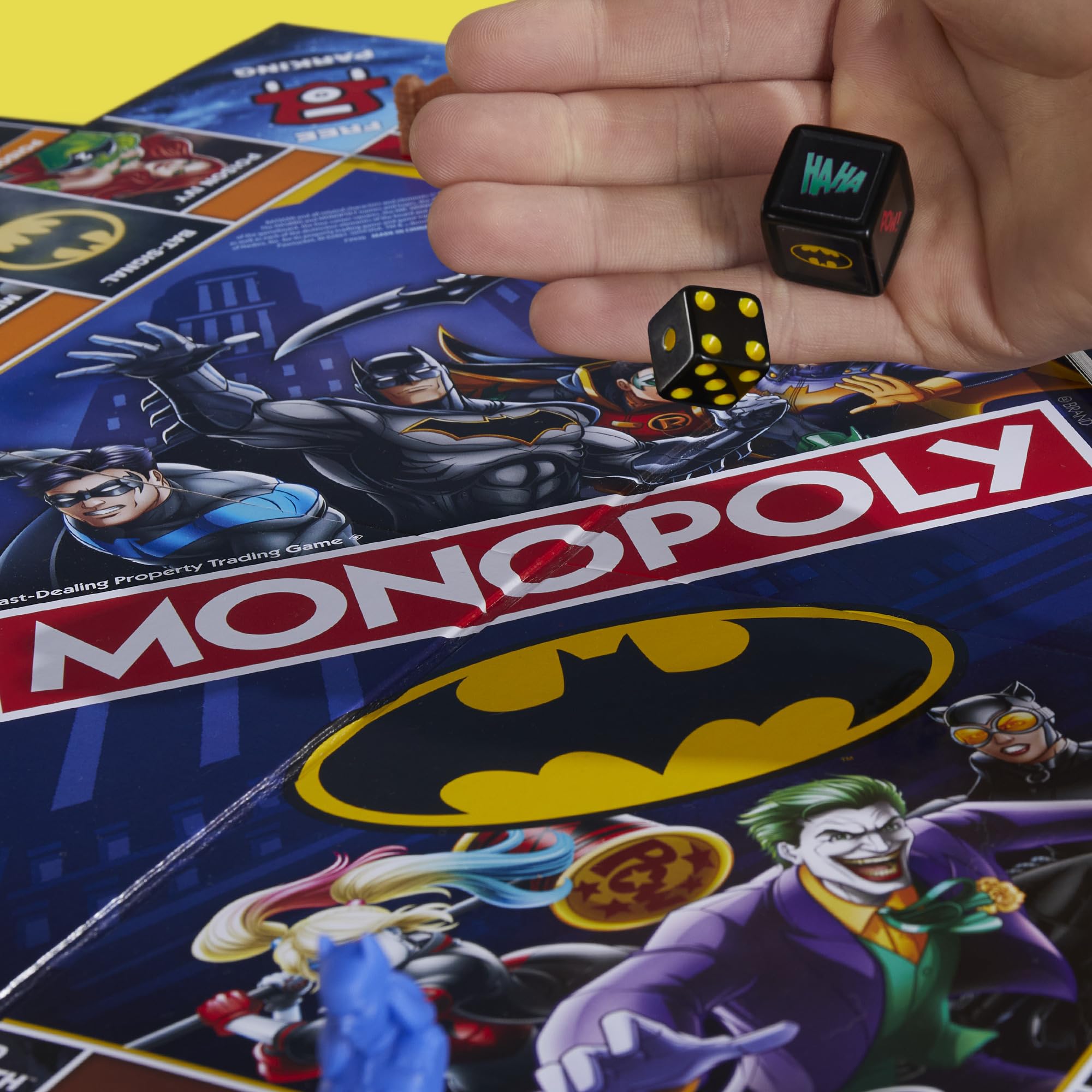 Hasbro Monopoly Batman Edition shows Batarangs used as currency for gameplay