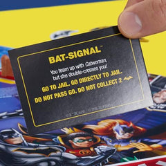 Hasbro Monopoly Batman Edition hero tokens navigate Gotham streets