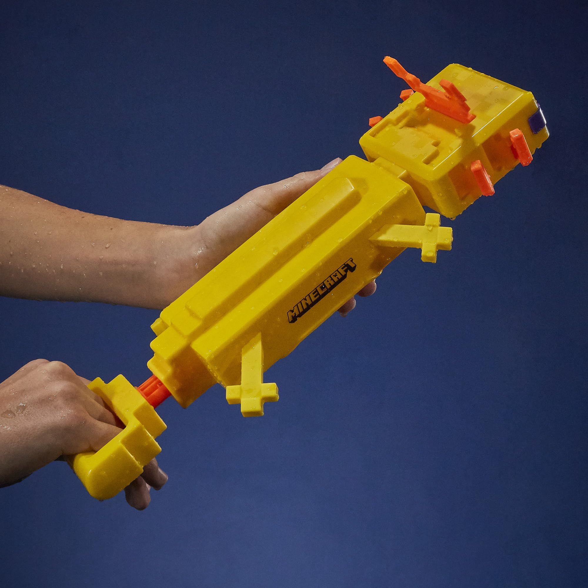 Hasbro Nerf Super Soaker Minecraft Axolotl Blaster splashes water and sparks outdoor fun