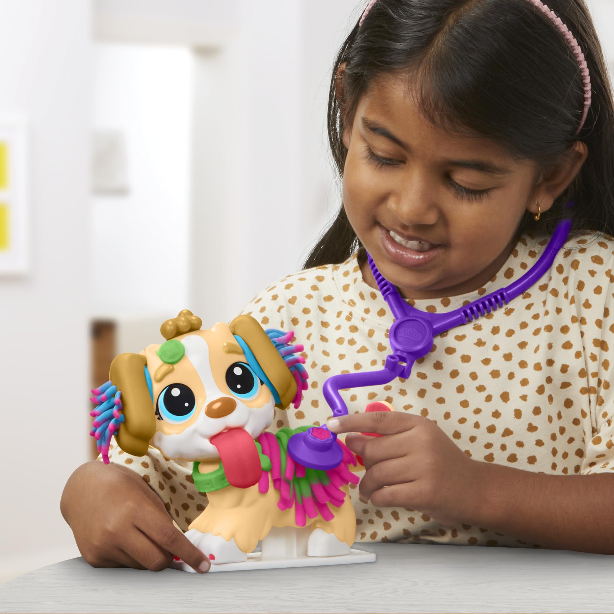 Hasbro Play-Doh Care 'n Carry Vet Playset hair styling tools for pups.