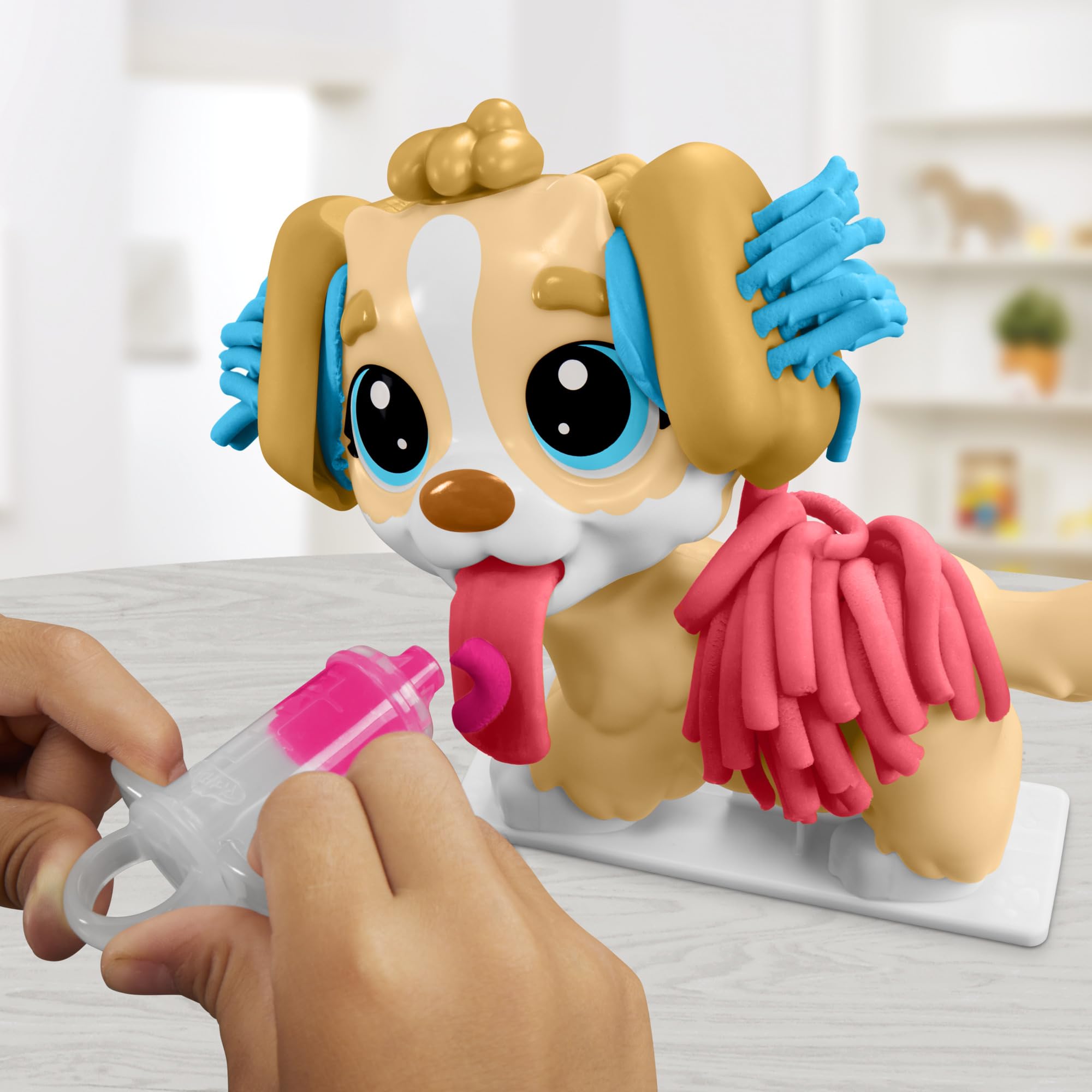 Hasbro Play-Doh Care 'n Carry Vet Playset pet carrier for storage and travel.
