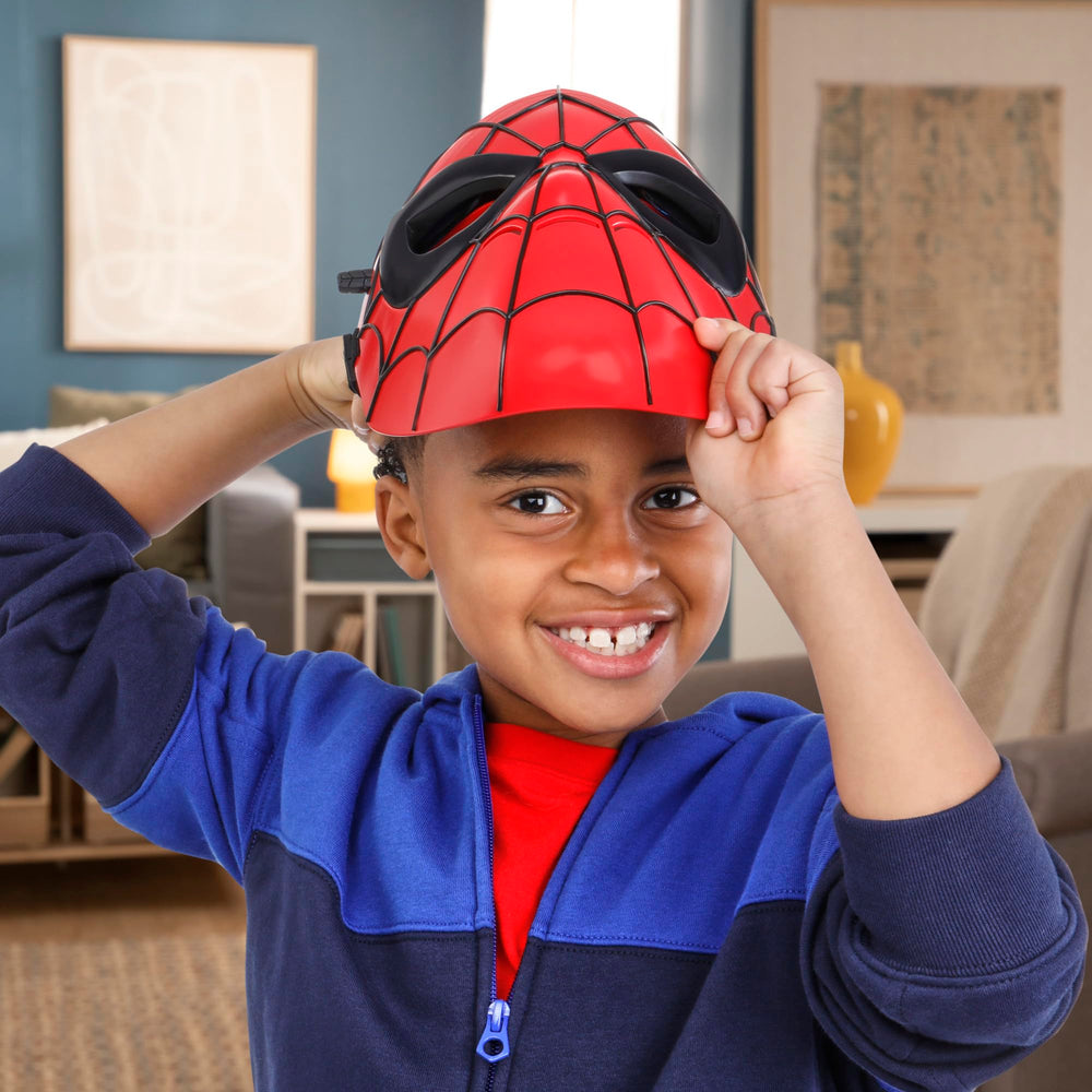 Hasbro Spider-Man Glow FX Mask side lever activates light-up eye lenses during action play.