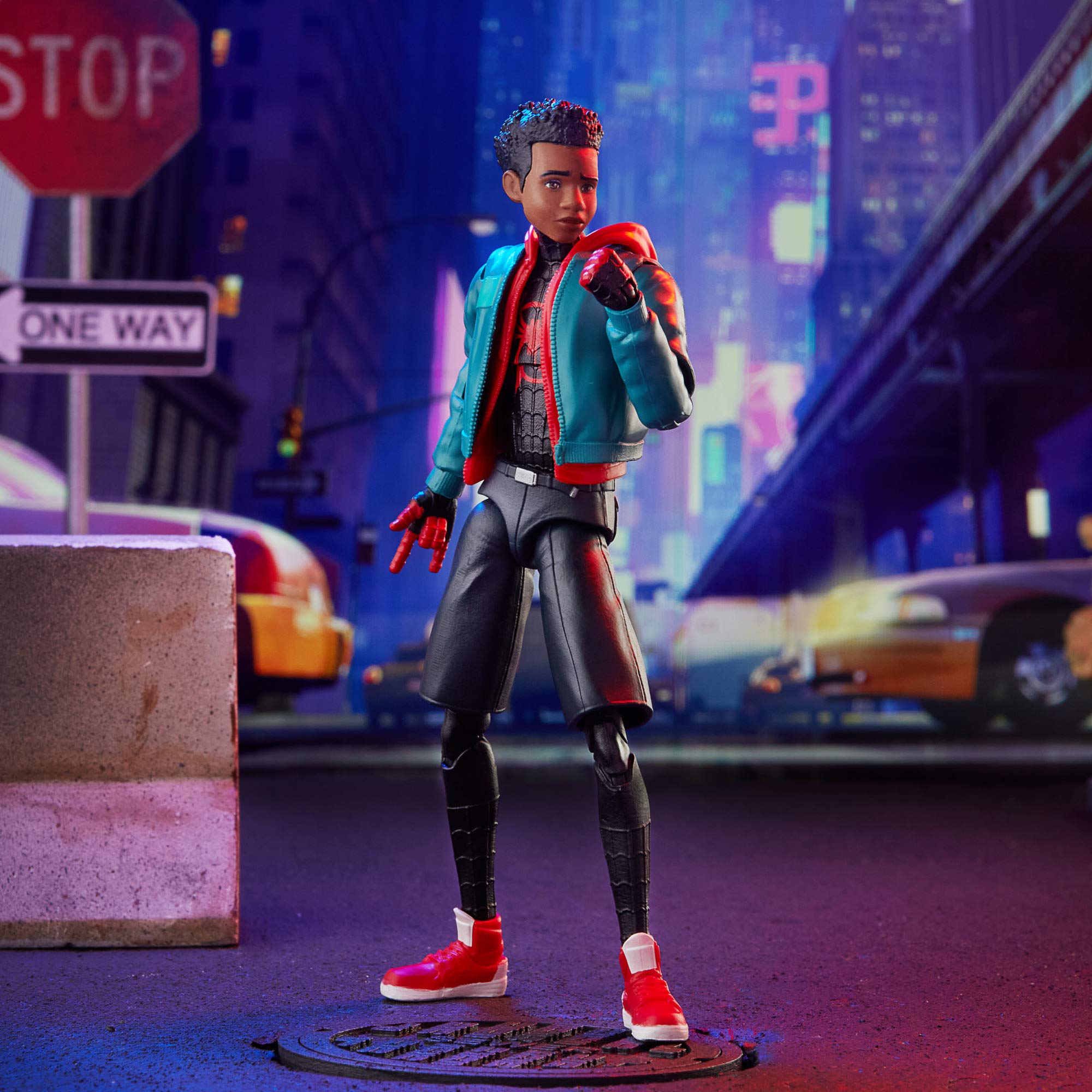 Miles Morales figure with pose-friendly stand on a shelf.
