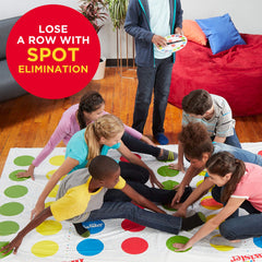 Hasbro Twister Ultimate spinner in action guiding moves on mat.