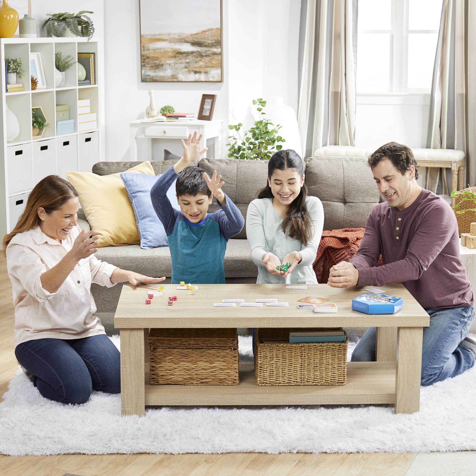 Family gathered around for a quick round of Yahtzee Frenzy