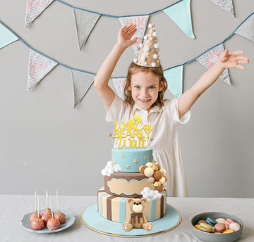 HAVAGDTM bear-ball-display shows a cohesive party topper setup.