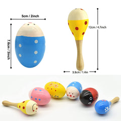 A toddler explores sounds with a Hayder wooden egg shaker in class.