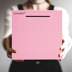 HCHANGEN piggy bank pink coins slot close-up highlights sealed design for disciplined saving.
