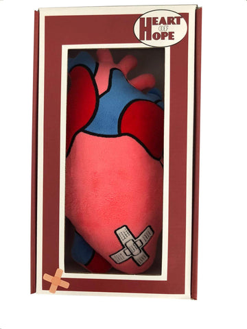Decorative use with Heart of Hope Zymise heart pillow enhances cozy spaces.