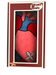 Decorative use with Heart of Hope Zymise heart pillow enhances cozy spaces.