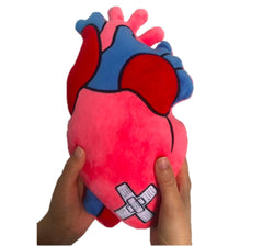 Side profile of Heart of Hope Zymise pillow highlighting thickness for chest support.