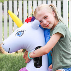 HearthSong Hop N Go unicorn bouncer lightweight and easy to transport outdoors