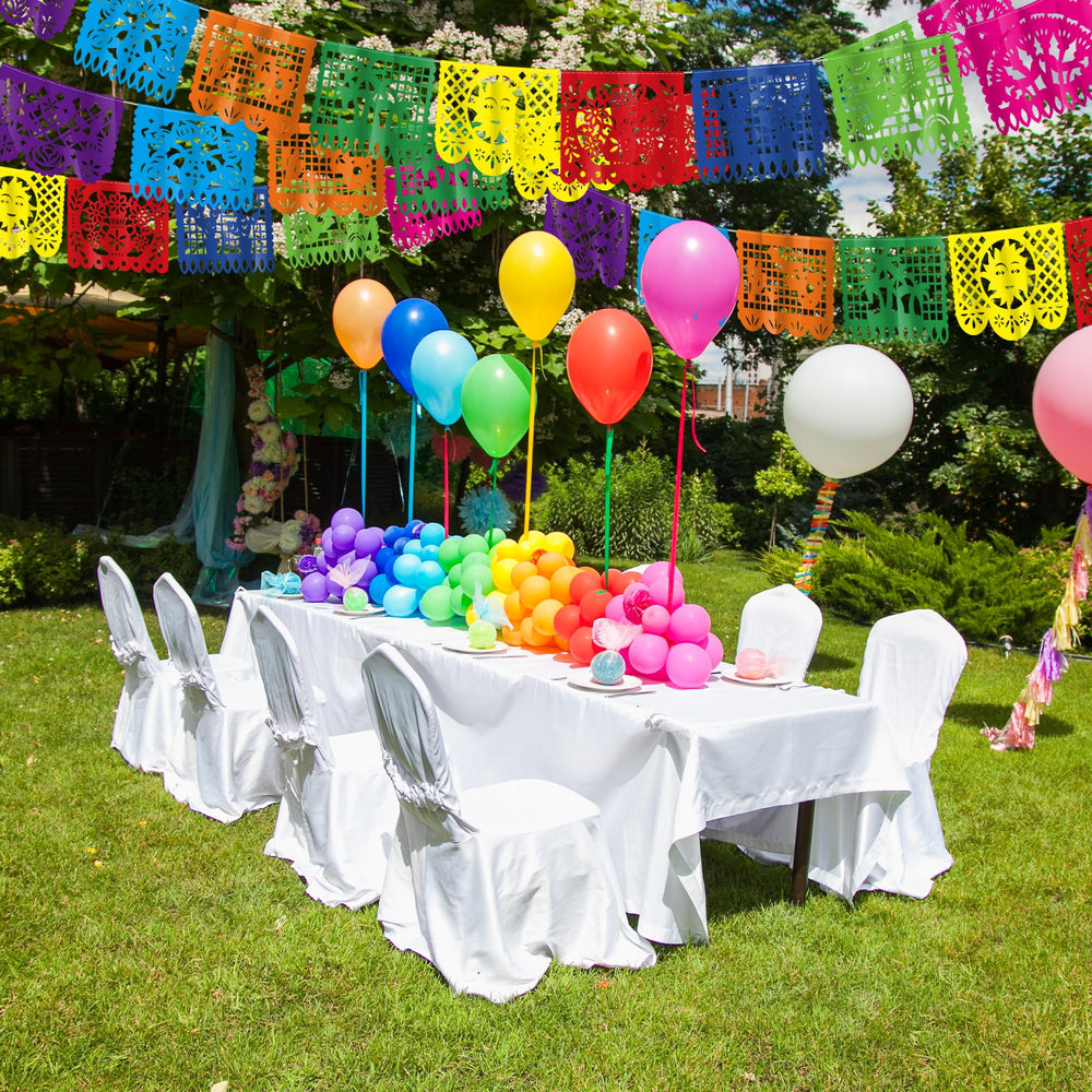 Heartome papel picado flag with flower motif adds decorative detail.