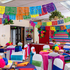 Heartome papel picado flag with sun motif brightens daytime celebrations.